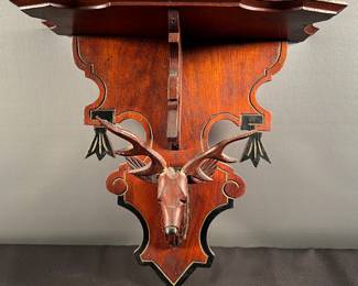 Carved deer wall shelf