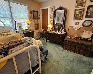 Yes, that is a beautiful and well cared for antique steamer trunk.