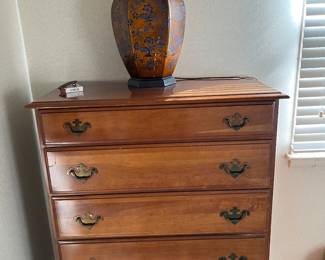 Pretty rust and dark blue Ginger Jar lamp on a 5 drawer dresser with Early American pulls...Both pieces very nice!
