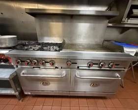 Cooking Performance Group S60-G24-N Natural Gas 6 Burner 60" Range with 24" Griddle and 2 Standard Ovens