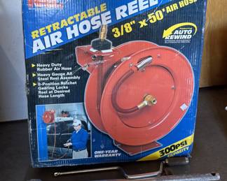 Retractable air hose reel