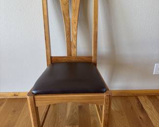 One of six Dining Chairs to the table