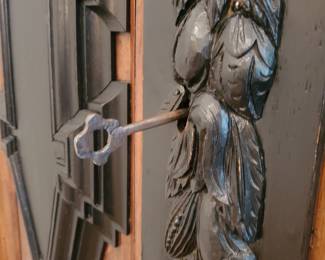 Detail from front of Baroque armore with Key
