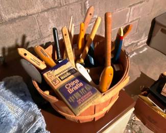 A whole basket of new paint brushes