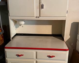 Sellers kitchen cabinet. Complete with flower bin. Very nice.