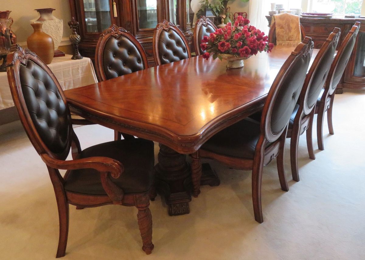 Dining table and chairs - 8 chairs, another leaf and table pads.  Perfect for big family holiday gatherings!
