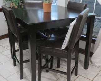 Bar height table with chairs