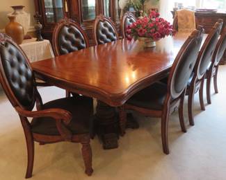 Dining table and chairs - 8 chairs, another leaf and table pads.  Perfect for big family holiday gatherings!