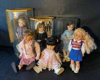 Collection of Porcelain Vinyl Collector Dolls with Display Cases