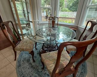 Fine Breakfast Table Set -- Round Glass Table, Wooden Chairs, Candelabra, Area Rug, Glass Hutch
