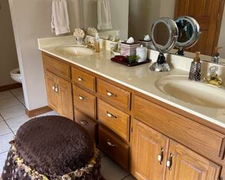 Ottoman and bathroom accessories.