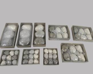 Nine Boxes Of Pebble Wax Candles