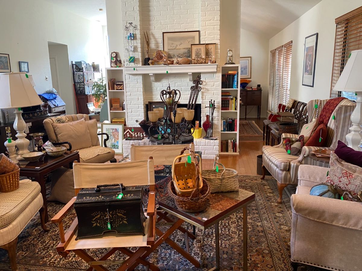 Living room packed with decoratives, Captain Chairs, Books, Wooden Cigar Boxes, Handcrafted pottery by Liam Cofell, Dwyer, Minnesota