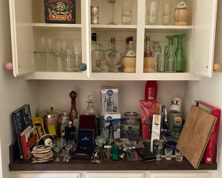 Large assortment of bar items from openers to decanters