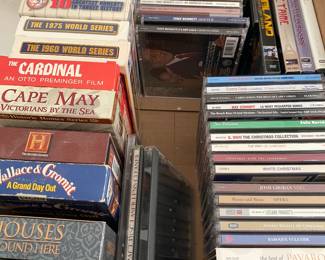 Three linear feet of VHS and CDs