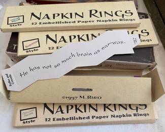 Embellished paper napkin rings with famous quotes