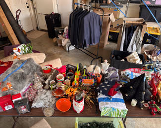 Halloween, Christmas, 4th of July, Thanksgiving and more decor.. Also suitcases, clothing, suits, men's shoes sizes 11, 12 & 13