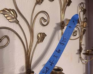 several sets of vintage brass wall sconces, wall pockets, candelabras and other brass decorative items