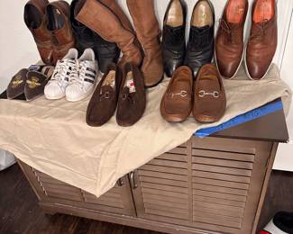 lots of women's and mens shoes from leather boots to loafers and slippers