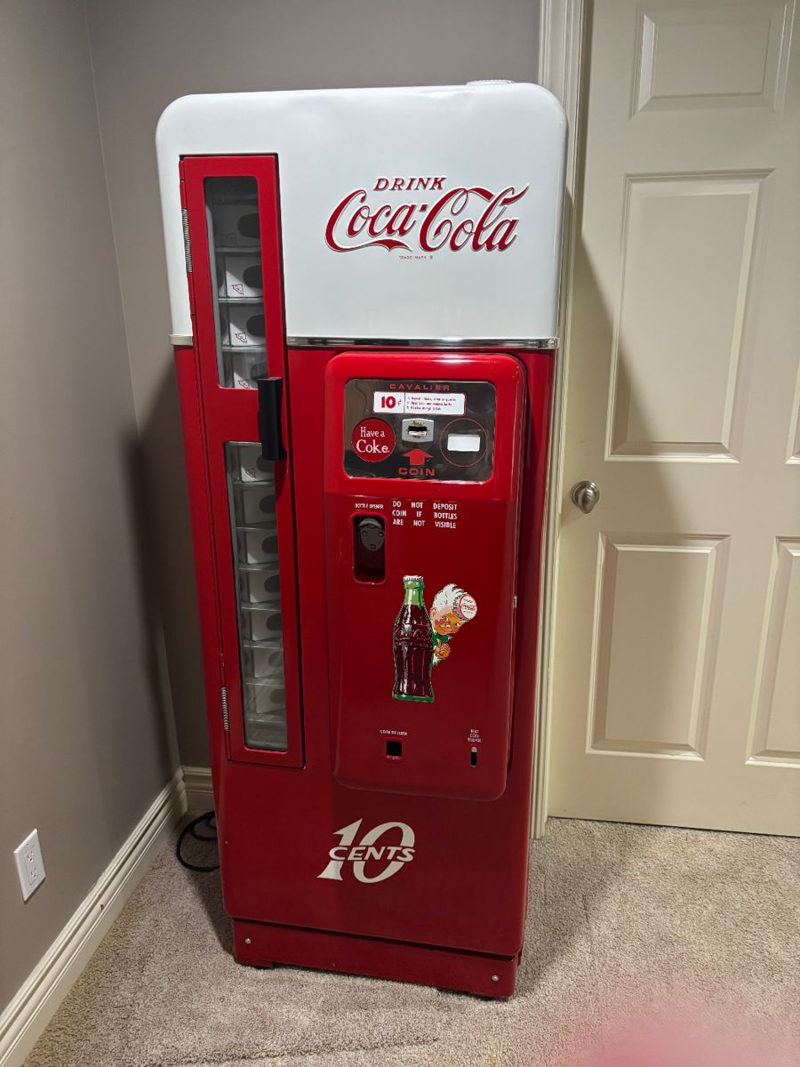 Spectacular vintage Coca-Cola machine. Grab an ice cold Coca-Cola.