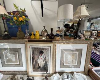 Several lamps and household decor and artwork.