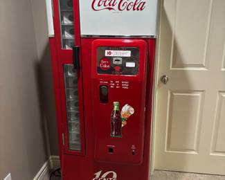 Spectacular vintage Coca-Cola machine. Grab an ice cold Coca-Cola.