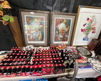 Collection of Coca-Cola bottles and Pepsi bottles and Coors baseball bat bottles. Tony Stewart, Rusty, Wallace and other collectible cars. Lithograph by Gary Butovnik.