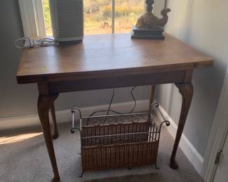 Oak table with folding leaf.