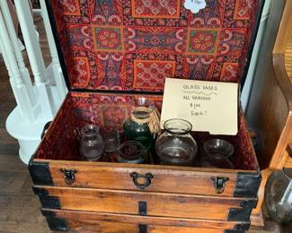 ARRRRGH. Its the family pirate chest filled with various glass vases.