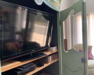 Storage area within armoire.