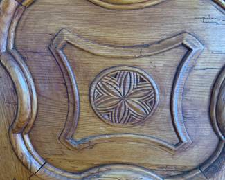 Fruitwood carving on door fronts.