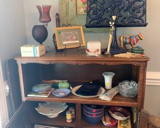 Iron book stand and various items.