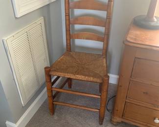 There are two of these ladder back chairs in excellent condition.