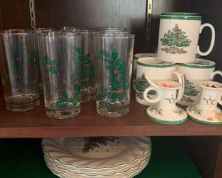 Spode Christmas plates, glasses, candlestick holders, mugs, pitcher and trivets.