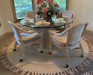 1970s Vintage McGuire Furniture Glass Top Dining Table w/four matching chairs on rollers!