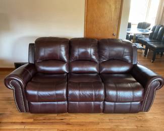 Leather Reclining Sofa ($150)