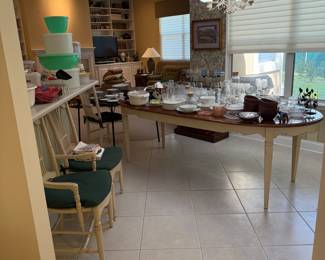 Drexel French country table with two leaves and six chairs.