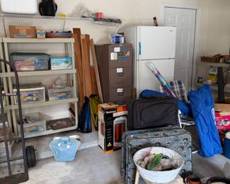 Whirlpool refrigerator, filing cabinet, dolly, igloo coolers, tools, gardening, equipment, ladder, tons of planters.