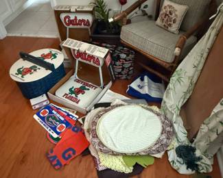 Florida gators vintage stadium seats, picnic tailgate basket, license plates, travel bags, notepad, hand fan, etc