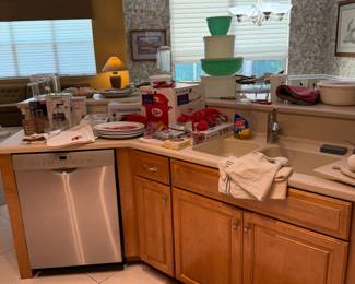 Brand new Le Creuset, Oneida flatware, vintage Tupperware, etc.