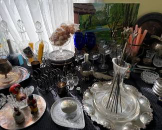 crystal decanters, toast holders and other fancy serving items