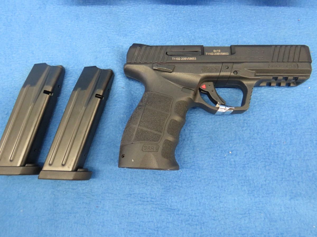 Lot 9. Sarsilmaz Sar 9. 9mm semi-auto pistol. Ser. #T1102-20BV58653. Includes manual, two magazines, extra grip pads, and case.