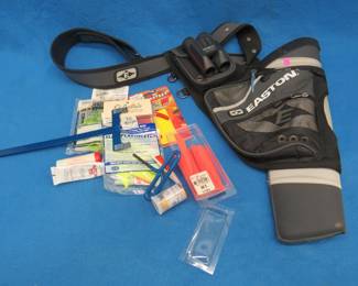 Lot 121. Archery equipment including an Easton target shooters quiver, Minolta 8 x 22 pocket binocular, and arrow building components.