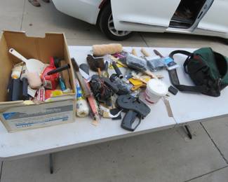 Lot 259. Painting supplies including three new brushes