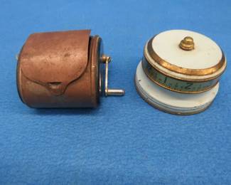 Lot 156. Vintage razor blade sharpener and a kitchen timer. Both are untested.
