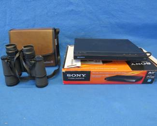 Lot 326. Sony DVD player and a set of Bushnell binoculars