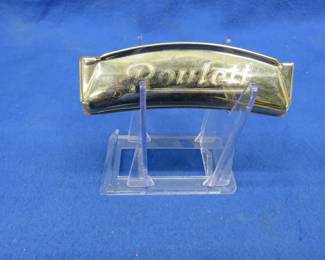 Lot 75. Musicus-Studio Roulett curved diatonic harmonica. Made in the U.S. Zone of Germany. Some low holes don't sound.