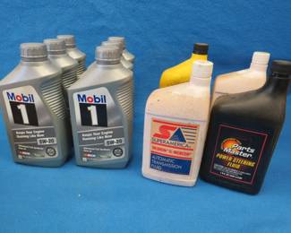Lot 217. Automotive fluids. Most are full.