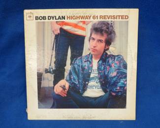 Lot 26. Bob Dylan Highway 61 Revisited LP. There is no sleeve but the record is in VG to excellent condition