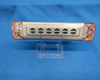 Lot 174. Double-sided, 9 1/4" 48-hole Ands Koch Tremolo concert. KochAmica harmonica